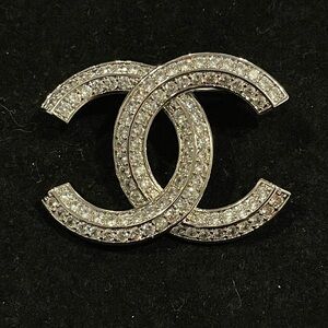 Fashion Jewelry Stamped Silver and Crystal Interlocking C Brooch